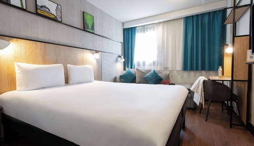 Habitación triple, varias camas