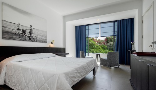 Two Interconnecting Rooms with Inland View