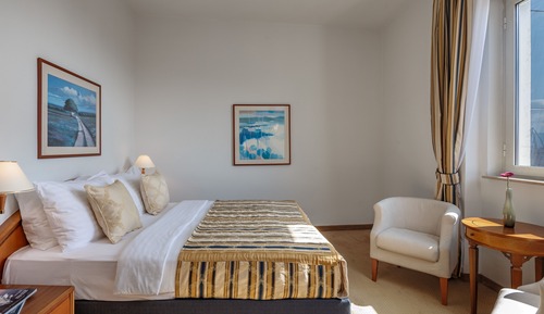 Habitación estándar con 1 cama doble o 2 individuales