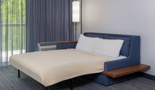 Suite, 1 cama de matrimonio grande con sofá cama, no fumadores, en esquina (Hearing Accessible)