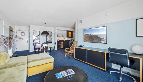 Suite, varias camas, vistas parciales al mar