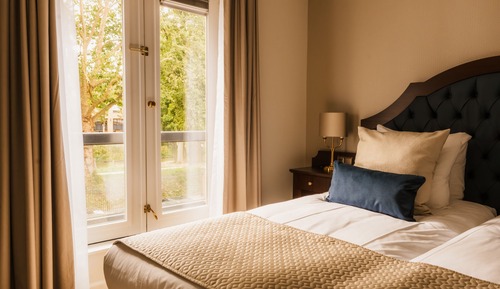 Suite ejecutiva, 2 camas dobles, no fumadores, vistas al jardín