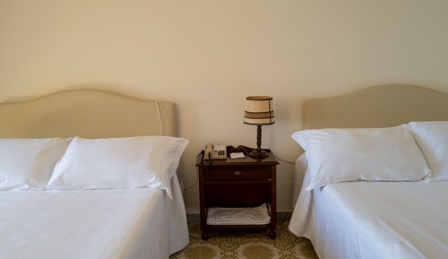 Habitación triple, vistas al mar