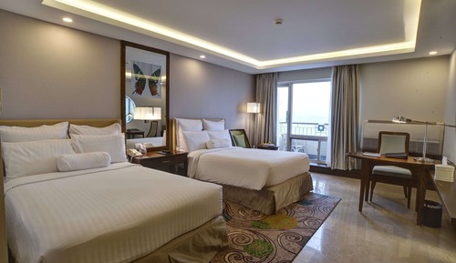 Habitación Deluxe con 1 cama doble o 2 individuales, balcón, vistas al jardín