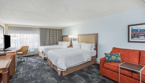 Two queen size bed with a queen size sofa bed
