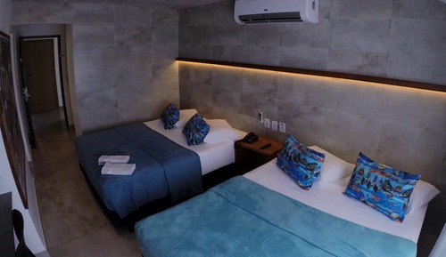 Quarto família 4, vista frente oceano