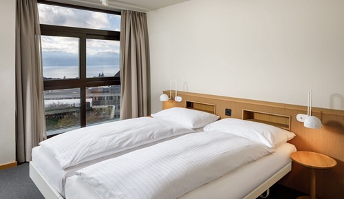 Habitación con 1 cama doble o 2 individuales, vistas a la ciudad