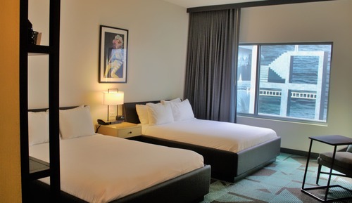 Habitación Deluxe, 2 camas de matrimonio, en una planta alta
