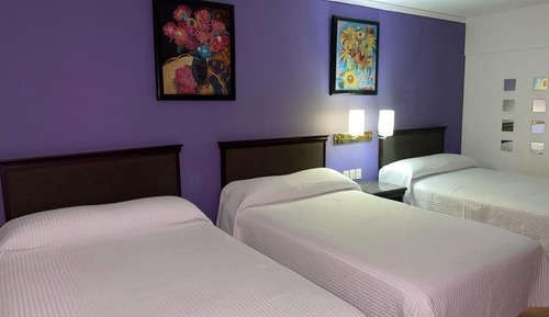 Habitación familiar, varias camas