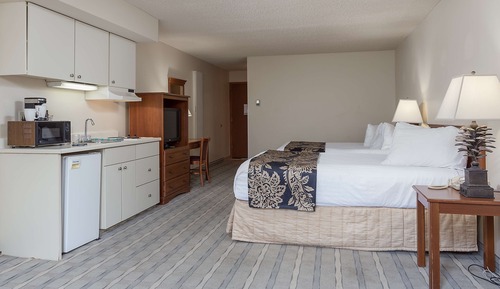 Habitación ejecutiva, 2 camas de matrimonio, cocina básica, vistas al río