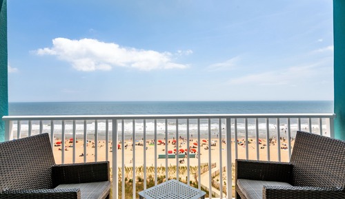 Suite junior, 2 camas de matrimonio, balcón, frente al mar