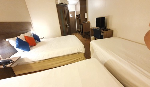 Habitación familiar, varias camas