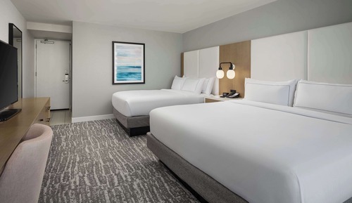 Habitación, varias camas, vistas al mar