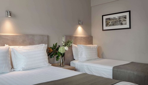 Habitación superior, varias camas