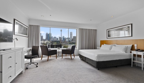 Suite, 1 cama de matrimonio grande, vistas a la ciudad