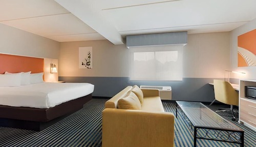 Suite Deluxe, 1 cama de matrimonio grande con sofá cama, no fumadores, bañera de hidromasaje