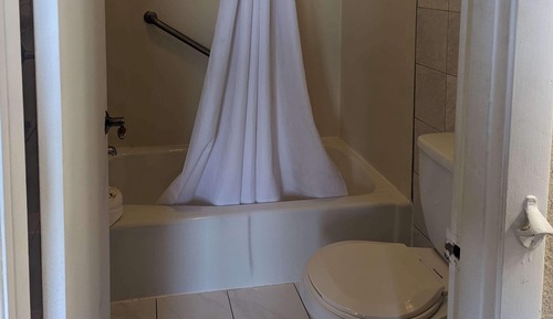 Suite, 1 cama de matrimonio grande con sofá cama, no fumadores (Exterior Corridor)