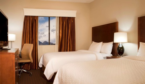 Suite, varias camas, 2 baños