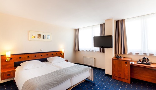 Habitación triple, varias camas