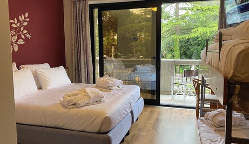 Deluxe Quadruple Room with  Balcony
