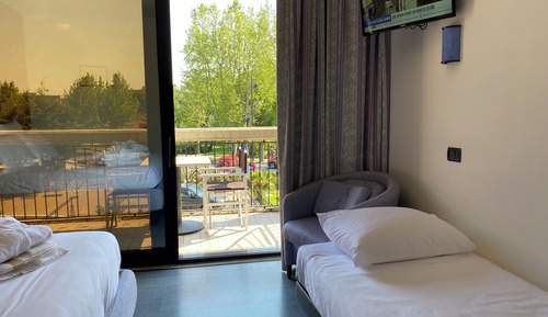 Deluxe Triple Room with Balcony