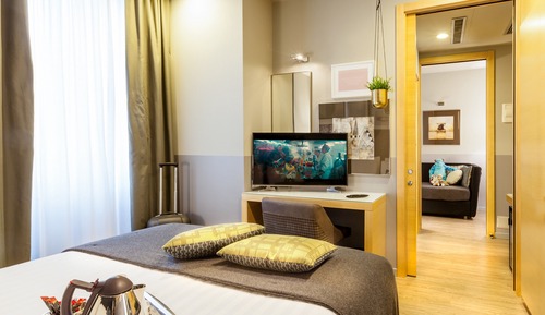 Habitación Premium, varias camas