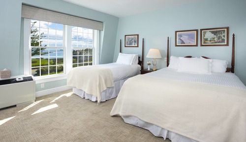 Habitación triple Deluxe, varias camas, vistas al mar