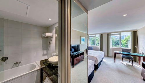 Habitación Premium con 1 cama doble o 2 individuales, varias camas