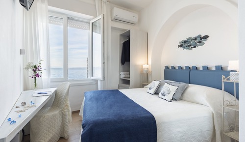 Habitación económica con 1 cama doble o 2 individuales, vistas al mar