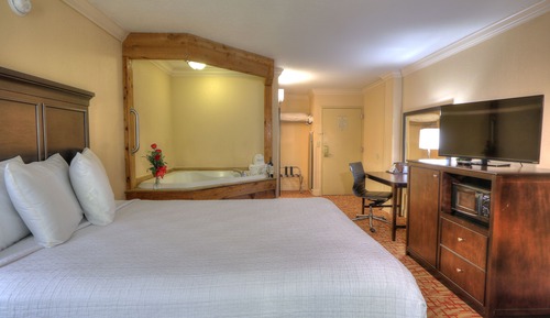 Habitación romántica, bañera de hidromasaje (Queen Bed)