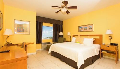 Habitación Deluxe, 1 cama de matrimonio grande, vistas parciales al mar