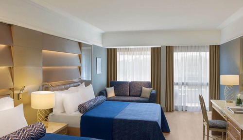 Habitación estándar con 1 cama doble o 2 individuales, balcón