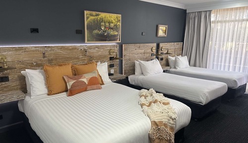 Habitación, varias camas