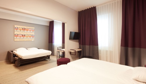 Habitación cuádruple, varias camas