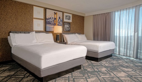 Suite, 2 camas de matrimonio, en esquina