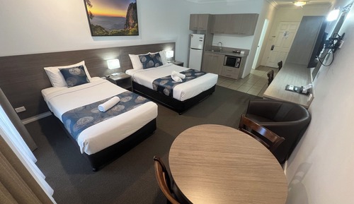 Suite Deluxe, varias camas, cocina básica