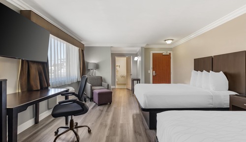 Habitación estándar, 2 camas de matrimonio, frigorífico y microondas, en esquina