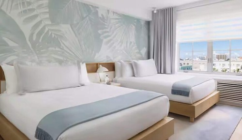 Habitación estándar, 2 camas de matrimonio, vistas parciales al mar