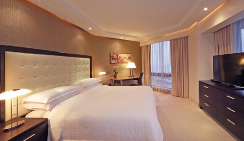 Suite ejecutiva, 1 cama de matrimonio grande, vistas a la ciudad