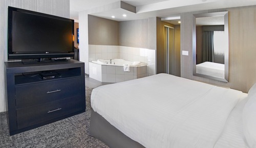 Suite, 1 cama de matrimonio grande con sofá cama, bañera de hidromasaje