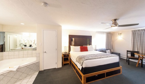 Suite Deluxe, 1 cama de matrimonio grande, bañera de hidromasaje