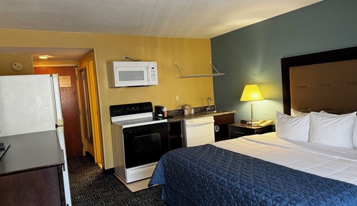 Habitación individual superior, 1 cama de matrimonio grande, cocina, vistas a la ciudad