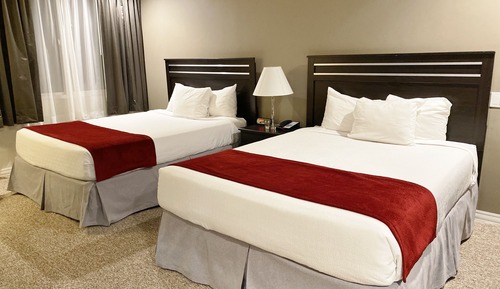 Suite ejecutiva, 2 camas de matrimonio