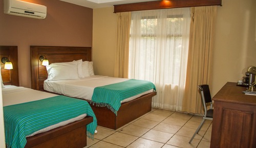Habitación triple estándar, varias camas