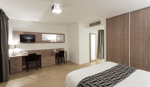 Apartamento ejecutivo, varias camas, cocina básica