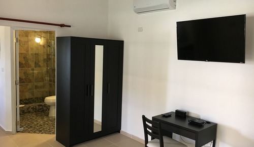 Suite Deluxe, 1 cama de matrimonio grande con sofá cama, patio, vistas a la piscina