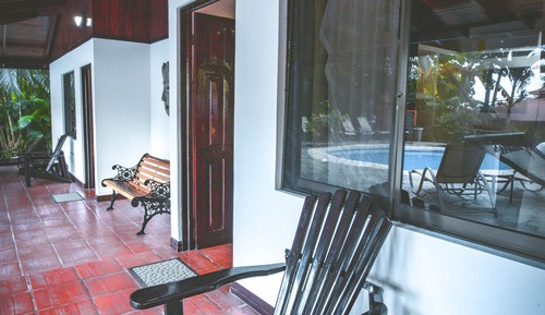 Habitación cuádruple, 2 camas dobles, patio, vistas a la piscina
