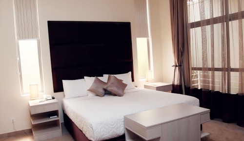 Habitación Deluxe, 1 cama de matrimonio grande, baño privado, vistas al patio