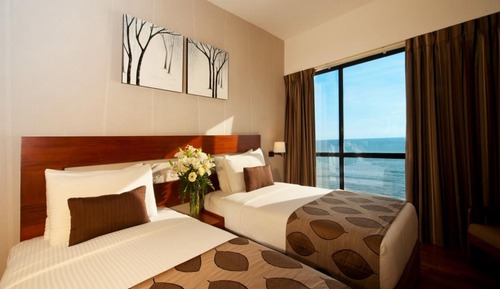 Habitación superior con 2 camas individuales, vistas al mar