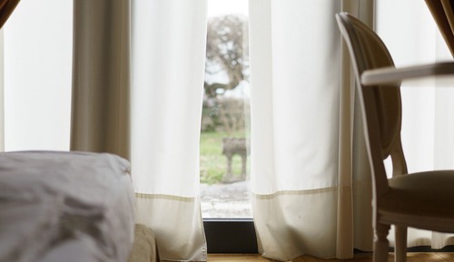Habitación ejecutiva con 1 cama doble o 2 individuales, vistas al jardín